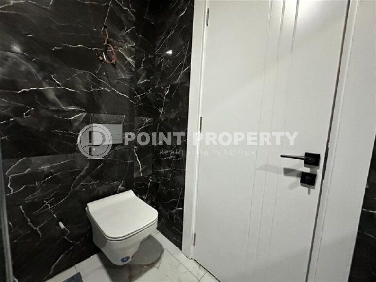 Modern apartment 55 m² in the center of Alanya with panoramic windows in a new complex-id-9597-photo-13