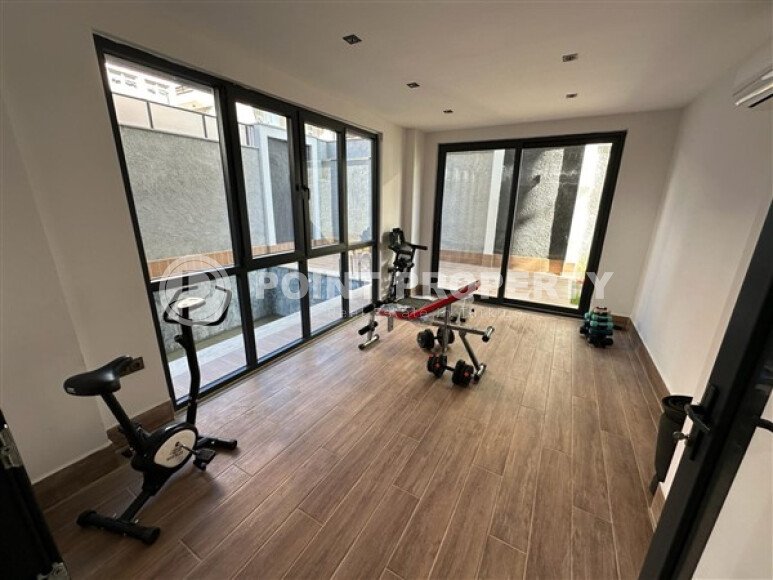 Modern apartment 55 m² in the center of Alanya with panoramic windows in a new complex-id-9597-photo-17