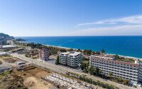 1+1 apartment with sea view in a complex on the first line in Kargicak-id-9601-photo-7