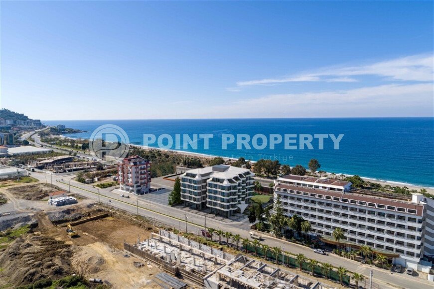 1+1 apartment with sea view in a complex on the first line in Kargicak-id-9601-photo-7