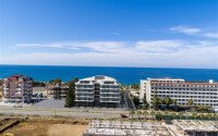 Квартира 1+1 с видом на море в комплексе на первой линии в Каргыджаке-id-9601-фото-8