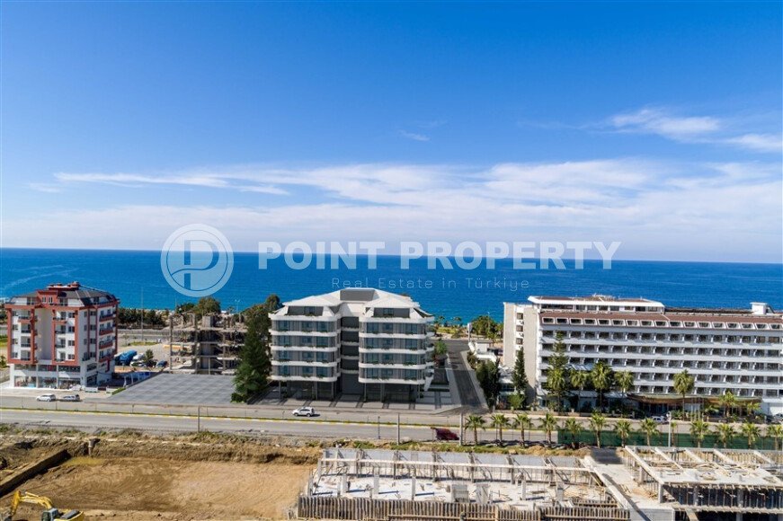 1+1 apartment with sea view in a complex on the first line in Kargicak-id-9601-photo-8