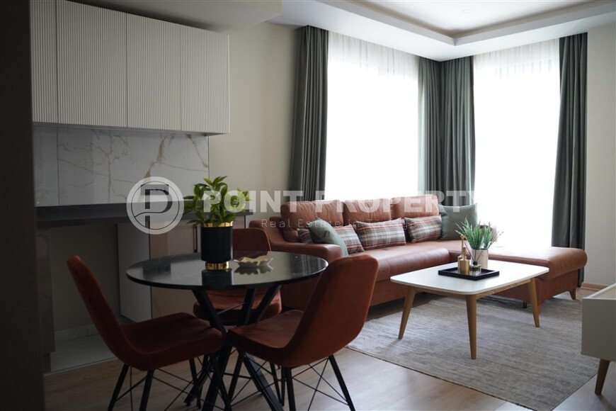 Стильная квартира 50 м² в центре Аланьи недалеко от пляжа Клеопатры в современном комплексе-id-9619-фото-1