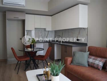 Стильная квартира 50 м² в центре Аланьи недалеко от пляжа Клеопатры в современном комплексе-id-9619-фото-2