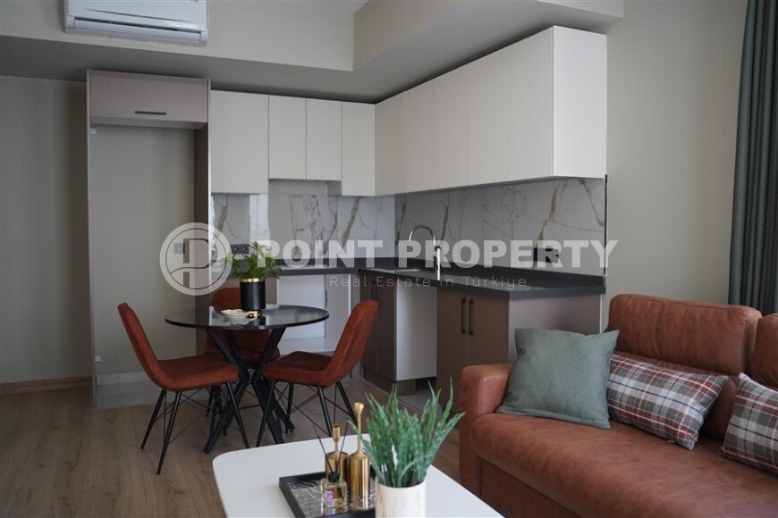 Стильная квартира 50 м² в центре Аланьи недалеко от пляжа Клеопатры в современном комплексе-id-9619-фото-2