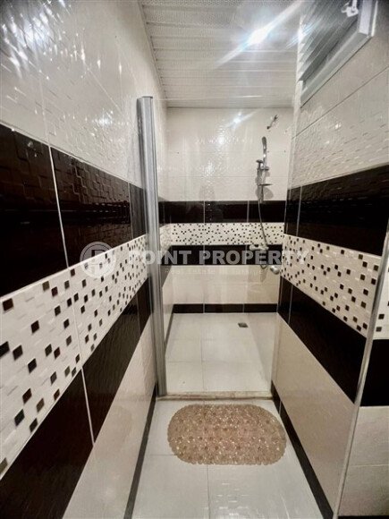 Меблированный дуплекс 100 м² в районе Джикджилли с частичным видом на море-id-9640-фото-12