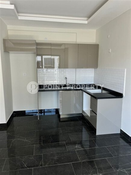 Modern apartment 47 m² in Mahmutlar in a complex with hotel infrastructure-id-9643-photo-1