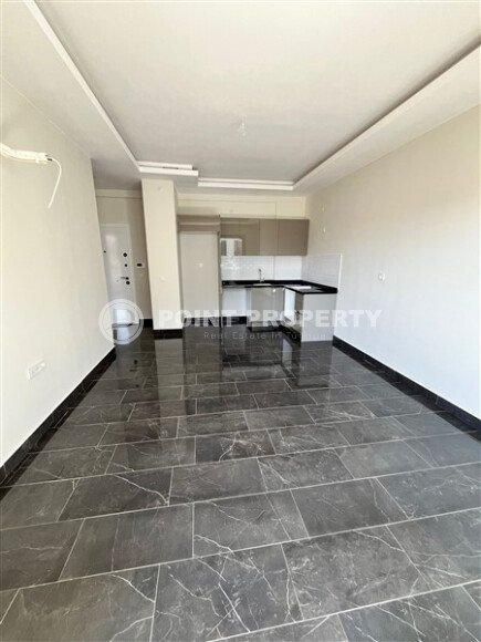 Современная квартира 47 м² в Махмутларе в комплексе с отельной инфраструктурой-id-9643-фото-3