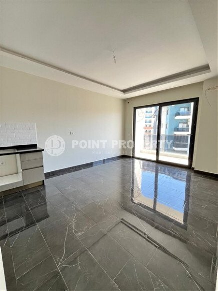 Современная квартира 47 м² в Махмутларе в комплексе с отельной инфраструктурой-id-9643-фото-6