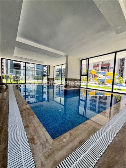 Современная квартира 47 м² в Махмутларе в комплексе с отельной инфраструктурой-id-9643-фото-18