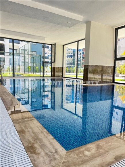 Современная квартира 47 м² в Махмутларе в комплексе с отельной инфраструктурой-id-9643-фото-20