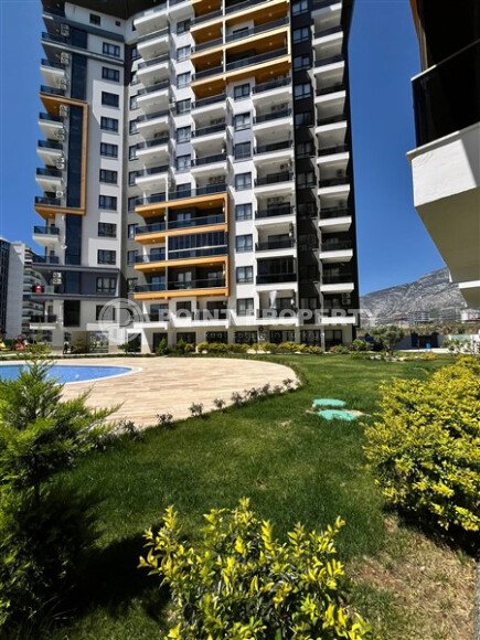 Современная квартира 47 м² в Махмутларе в комплексе с отельной инфраструктурой-id-9643-фото-22