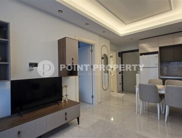 Современная квартира 60 м² в Махмутларе на первой линии с мебелью и видом на горы-id-9645-фото-2