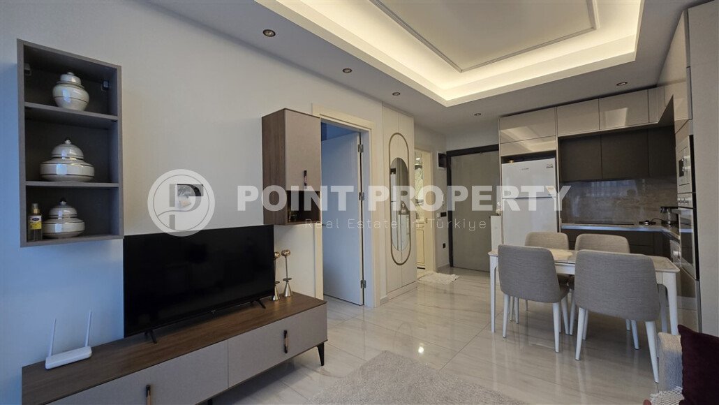 Современная квартира 60 м² в Махмутларе на первой линии с мебелью и видом на горы-id-9645-фото-2