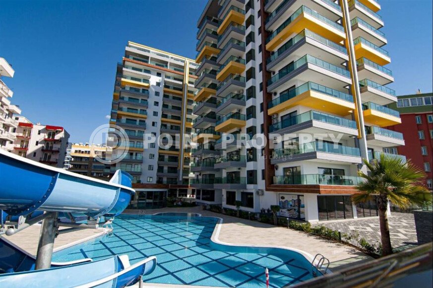 Elegant 90 m² apartment in Mahmutlar on the first coastline-id-9646-photo-1