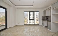 Квартира 1+1, 47 м² в Махмутларе в новом комплексе с инфраструктурой-id-9675-фото-1