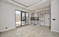 Квартира 1+1, 47 м² в Махмутларе в новом комплексе с инфраструктурой-id-9675-фото-2