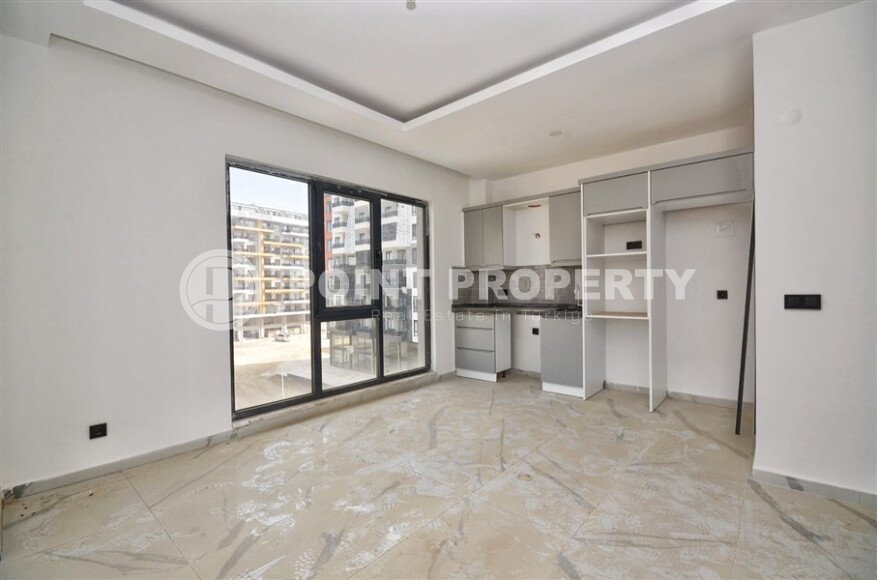 Квартира 1+1, 47 м² в Махмутларе в новом комплексе с инфраструктурой-id-9675-фото-2