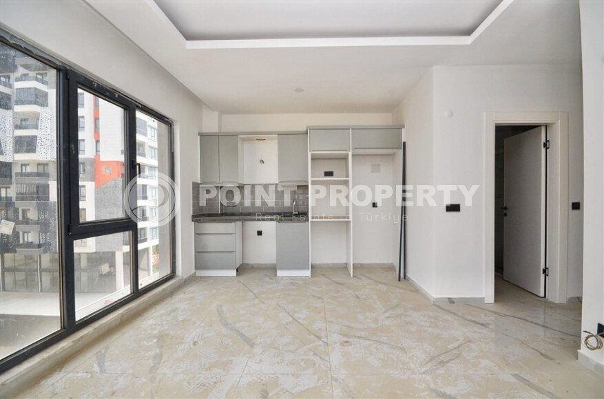 Квартира 1+1, 47 м² в Махмутларе в новом комплексе с инфраструктурой-id-9675-фото-3