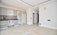 Квартира 1+1, 47 м² в Махмутларе в новом комплексе с инфраструктурой-id-9675-фото-4