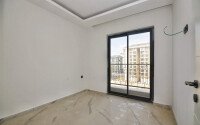 Квартира 1+1, 47 м² в Махмутларе в новом комплексе с инфраструктурой-id-9675-фото-7