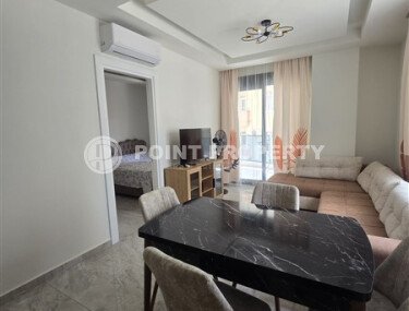 Elegant apartment 57 m² in the center of Alanya, private beach, luxury infrastructure-id-9684-photo-3