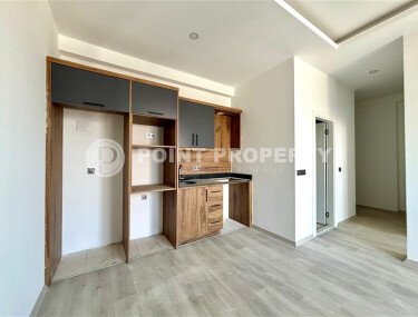 Современная квартира 50 м² в районе Махмутлар в новом комплексе с инфраструктурой-id-9710-фото-2