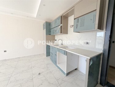 Апартаменты на срочной продаже в новом доме в районе Махмутлар-id-9714-фото-3