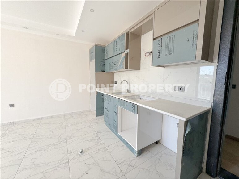 Апартаменты на срочной продаже в новом доме в районе Махмутлар-id-9714-фото-3