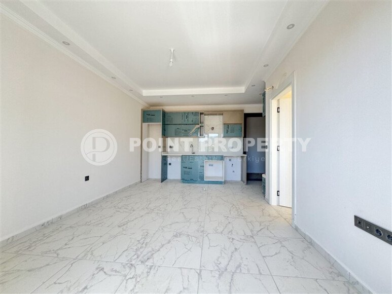 Апартаменты на срочной продаже в новом доме в районе Махмутлар-id-9714-фото-6