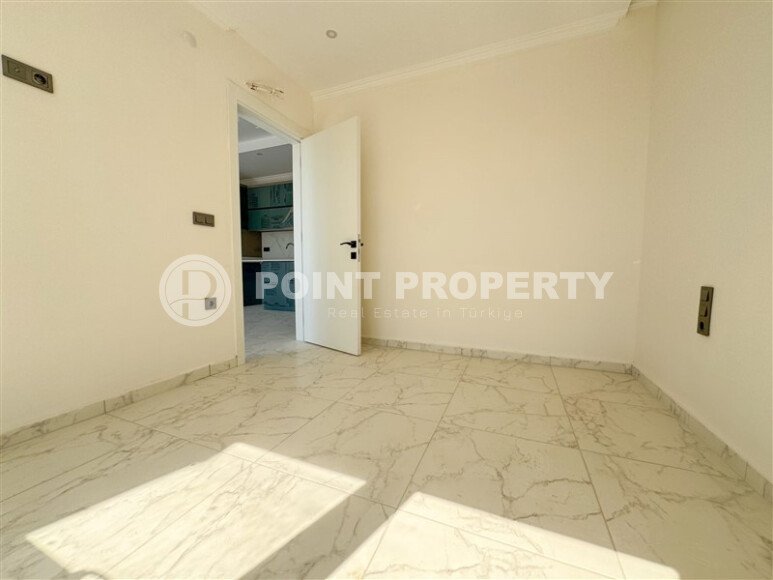 Апартаменты на срочной продаже в новом доме в районе Махмутлар-id-9714-фото-7