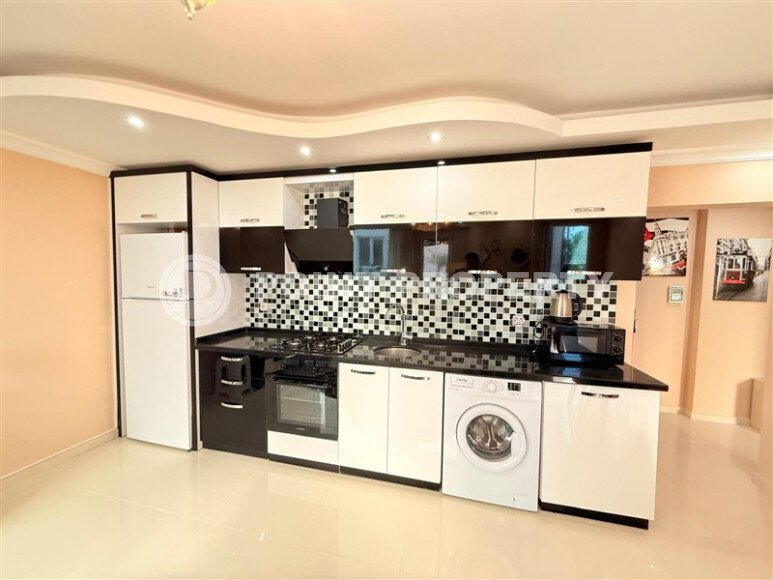 Стильная квартира  60 м² в районе Клеопатры, центр Аланьи с паркингом и большой территорией, ВНЖ-id-9723-фото-6