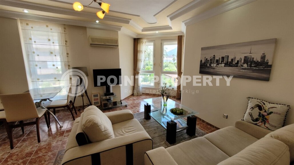 Cozy apartment 100 m² with furniture in Tosmur near the sea and mountain view, residence permit-id-9725-photo-1