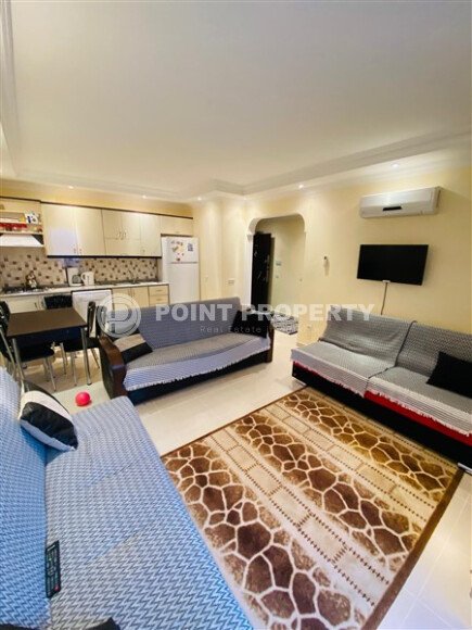 Комфортная квартира 1+1 площадью 65 м² в Махмутларе-id-9730-фото-2