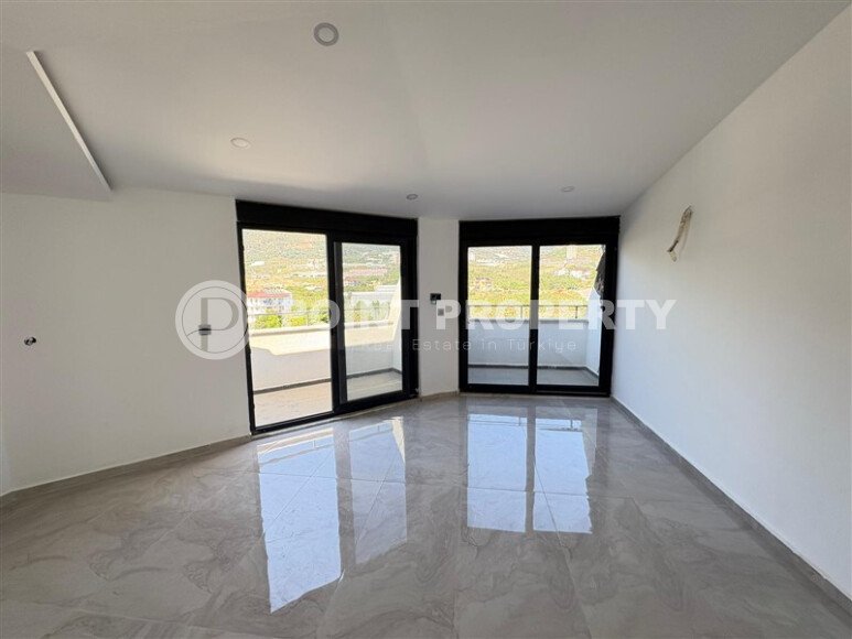 Двухуровневая квартира 2+1 площадью 100 м² в Махмутларе-id-9731-фото-2