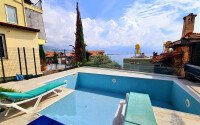 Stylish 78 m² apartment with terrace, garden and swimming pool in Kale area – in the heart of Alanya-id-9734-photo-1