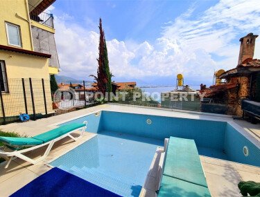 Stylish 78 m² apartment with terrace, garden and swimming pool in Kale area – in the heart of Alanya-id-9734-photo-2