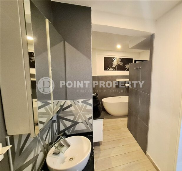 Stylish 78 m² apartment with terrace, garden and swimming pool in Kale area – in the heart of Alanya-id-9734-photo-13