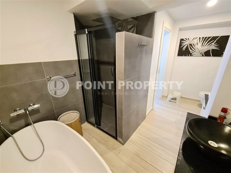 Stylish 78 m² apartment with terrace, garden and swimming pool in Kale area – in the heart of Alanya-id-9734-photo-15