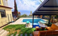 Stylish 78 m² apartment with terrace, garden and swimming pool in Kale area – in the heart of Alanya-id-9734-photo-18