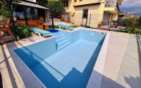 Stylish 78 m² apartment with terrace, garden and swimming pool in Kale area – in the heart of Alanya-id-9734-photo-21