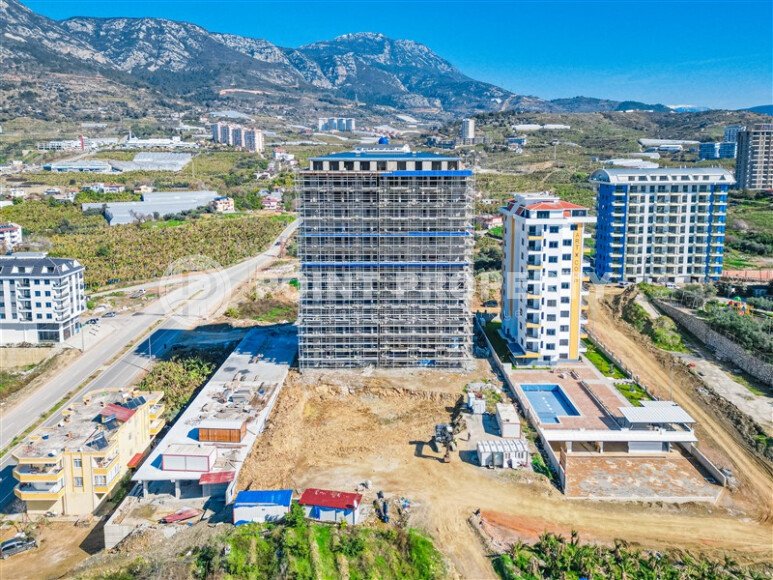 High floor apartment in a complex at the final stage of construction in Mahmutlar-id-9739-photo-33