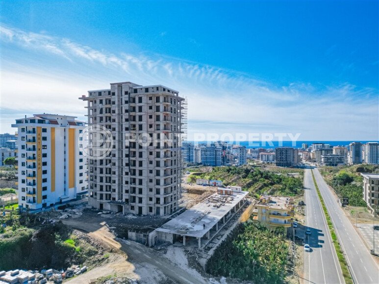 High floor apartment in a complex at the final stage of construction in Mahmutlar-id-9739-photo-35