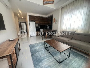 Apartment 2+1 on a high floor in a hotel-type complex in Mahmutlar-id-9740-photo-1