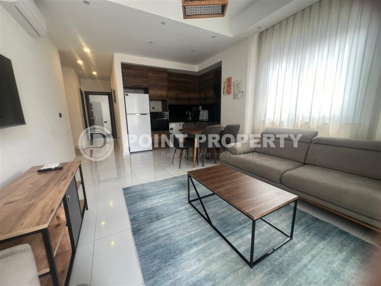 Apartment 2+1 on a high floor in a hotel-type complex in Mahmutlar-id-9740-photo-1