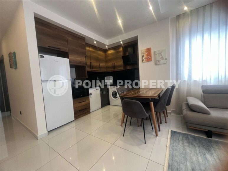 Apartment 2+1 on a high floor in a hotel-type complex in Mahmutlar-id-9740-photo-2