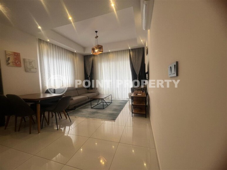 Квартира 2+1 на высоком этаже в комплексе отельного типа в Махмутларе-id-9740-фото-3