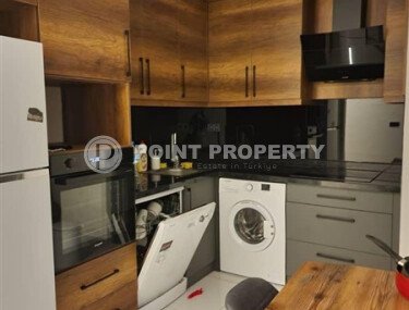 Apartment 2+1 on a high floor in a hotel-type complex in Mahmutlar-id-9740-photo-4