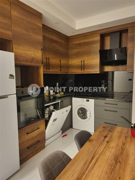 Apartment 2+1 on a high floor in a hotel-type complex in Mahmutlar-id-9740-photo-4