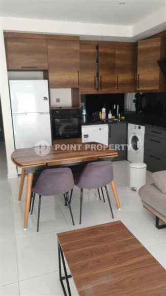 Apartment 2+1 on a high floor in a hotel-type complex in Mahmutlar-id-9740-photo-5